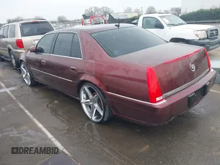 2007 Cadillac DTS Luxury I z VIN 1G6KD57Y07U142067, wystawiony jako IAAI lot #41797850 z przebiegiem 179 639 mil mil oraz . Historia ofert i sprzedaży dostępna na DreamBid. Obrazek 3.