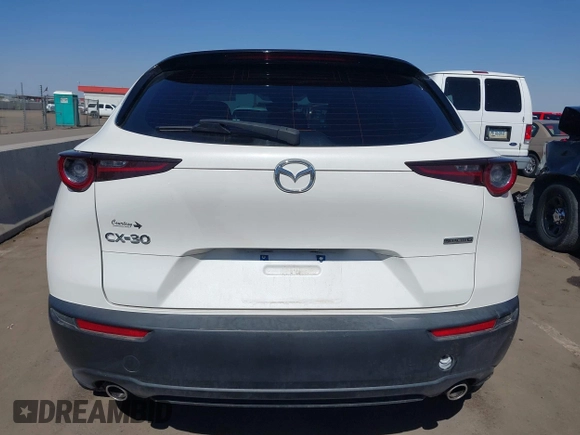 2021 Mazda CX-30 S with VIN 3MVDMAAL5MM303944, listed as a IAAI auction lot 41687532 with 35,379 mi miles and . Bid and sale history available at DreamBid. Image 17.
