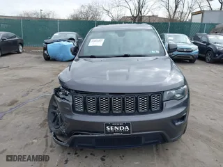 2018 Jeep Grand Cherokee Laredo E with VIN 1C4RJFAG4JC464783, listed as a IAAI auction lot 41664453 with 106,466 mi miles. Bid and sale history available at carsss.com. Image 12.