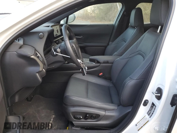 2024 Lexus UX 250h Premium with VIN JTHP9JBHXR2077083, listed as a Copart auction lot 76112004 with 22,385 mi miles and Salvage title. Bid and sale history available at DreamBid. Image 7.