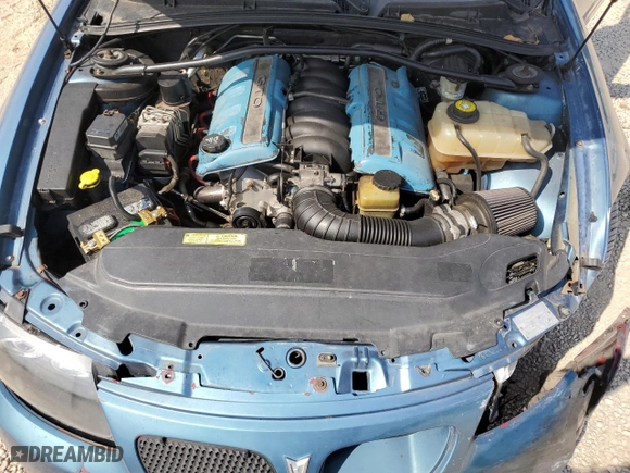 2004 Pontiac GTO with VIN 6G2VX12G34L234081, listed as a Copart auction lot 75905434 with 153,447 mi miles and Salvage Title. Bid and sale history available at carsss.com. Image 12.