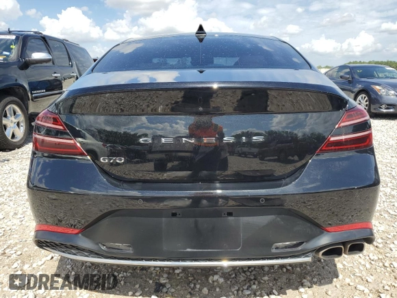 2022 Genesis G70 2.0T with VIN KMTG34TA2NU103729, listed as a Copart auction lot 65336264 with 51,705 mi miles and Salvage Title. Bid and sale history available at carsss.com. Image 6.