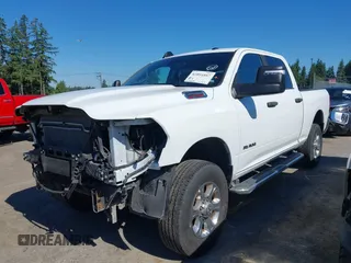 2024 Ram 2500 Big Horn with VIN 3C6UR5DJ2RG286053, listed as a IAAI auction lot 42054467 with 26,834 mi miles and . Bid and sale history available at DreamBid. Image 2.