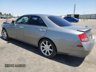 2003 Infiniti M45 with VIN JNKAY41EX3M003112, listed as a Copart auction lot 65253884 with 155,582 mi miles and Salvage Title. Bid and sale history available at carsss.com. Image 2.