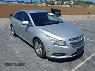 2014 Chevrolet Cruze 1LT with VIN 1G1PC5SB7E7421688, listed as a IAAI auction lot 42643186 with 158,994 mi miles and . Bid and sale history available at DreamBid. Image 1.