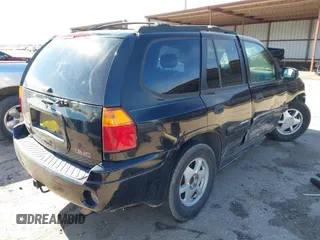 2003 GMC Envoy SLE with VIN 1GKDS13S732134354, listed as a IAAI auction lot 41305506 with 221,733 mi miles. Bid and sale history available at carsss.com. Image 4.