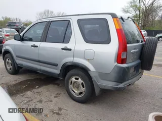 2002 Honda CR-V LX with VIN JHLRD68422C015173, listed as a IAAI auction lot 41959037 with 217,058 mi miles and . Bid and sale history available at carsss.com. Image 3.