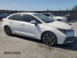 2020 Toyota Corolla SE with VIN JTDS4RCE7LJ031088, listed as a Copart auction lot 55450795 with 148,455 mi miles and Clean Title. Bid and sale history available at DreamBid. Image 4.
