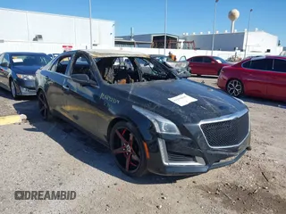 2014 Cadillac CTS AWD z VIN 1G6AW5SX6E0197020, wystawiony jako IAAI lot #41228636 z przebiegiem Nie podano mil oraz . Historia ofert i sprzedaży dostępna na DreamBid. Obrazek 1.