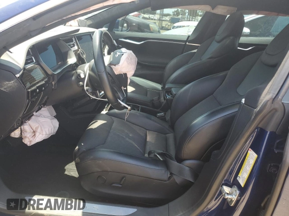 2018 Tesla Model S 75D with VIN 5YJSA1E25JF249743, listed as a Copart auction lot 59636235 with 101,275 mi miles and Salvage title. Bid and sale history available at DreamBid. Image 7.