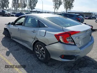 2016 Honda Civic Sedan EX with VIN 2HGFC2F74GH563268, listed as a IAAI auction lot 41805038 with 125,577 mi miles. Bid and sale history available at carsss.com. Image 3.