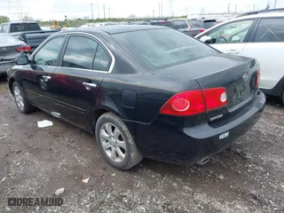 2007 Kia Optima LX with VIN KNAGE124975133923, listed as a IAAI auction lot 42007990 with 87,768 mi miles. Bid and sale history available at carsss.com. Image 3.