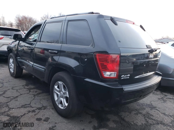 2007 Jeep Grand Cherokee Laredo with VIN 1J8GR48K17C543067, listed as a Copart auction lot 84442224 with 125,446 mi miles and Salvage Title. Bid and sale history available at carsss.com. Image 2.