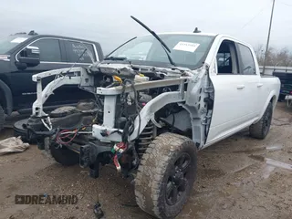 2018 Ram 2500 Laramie with VIN 3C6UR5FL7JG260700, listed as a IAAI auction lot 41343304 with Not provided miles and . Bid and sale history available at DreamBid. Image 2.
