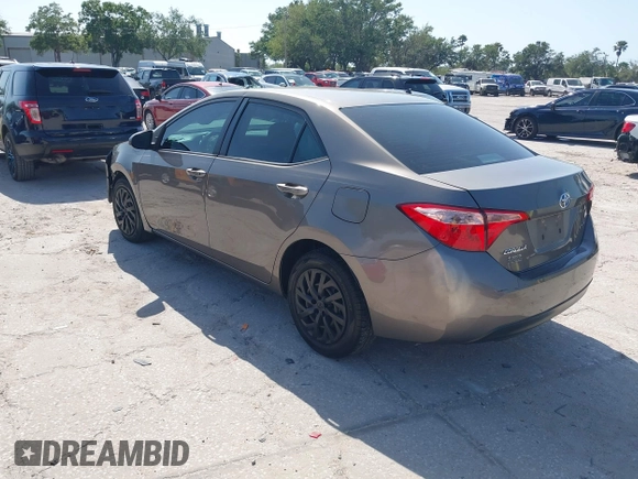 2019 Toyota Corolla L with VIN 5YFBURHE7KP878972, listed as a IAAI auction lot 42000888 with 201,612 mi miles. Bid and sale history available at carsss.com. Image 3.