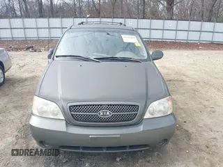 2004 Kia Sedona LX with VIN KNDUP131546543841, listed as a IAAI auction lot 41541012 with 112,122 mi miles. Bid and sale history available at carsss.com. Image 12.