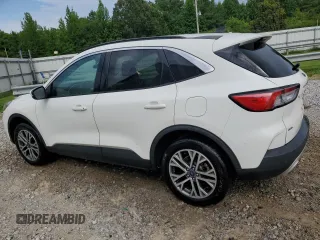 2021 Ford Escape SEL z VIN 1FMCU9H67MUA65291, wystawiony jako Copart lot #63403555 z przebiegiem 122 034 mil mil oraz Szkoda całkowita • Salvage title. Historia ofert i sprzedaży dostępna na DreamBid. Obrazek 2.
