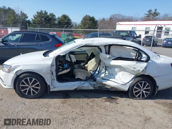 2017 Volkswagen Jetta SE with VIN 3VWDB7AJ7HM210497, listed as a IAAI auction lot 38571376 with 160,008 mi miles and . Bid and sale history available at DreamBid. Image 14.