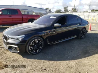 2018 BMW 7 Series M760i xDrive with VIN WBA7H6C50JG614781, listed as a Copart auction lot 83689234 with 49,873 mi miles and Salvage Title. Bid and sale history available at carsss.com. Image 1.