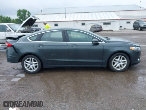 2015 Ford Fusion SE z VIN 1FA6P0HD9F5101925, wystawiony jako IAAI lot #42314400 z przebiegiem 159 548 mil mil oraz . Historia ofert i sprzedaży dostępna na DreamBid. Obrazek 13.