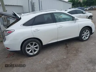 2011 Lexus RX 350 with VIN JTJZK1BA4B2411340, listed as a IAAI auction lot 42465830 with 185,359 mi miles and . Bid and sale history available at DreamBid. Image 4.