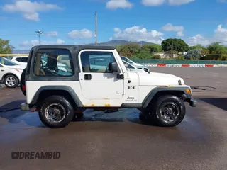 2004 Jeep Wrangler X z VIN 1J4FA39S04P747828, wystawiony jako IAAI lot #41484240 z przebiegiem Nie podano mil oraz . Historia ofert i sprzedaży dostępna na DreamBid. Obrazek 14.