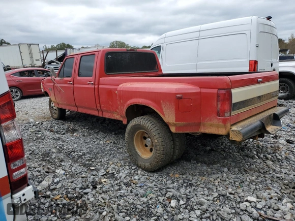 1996 Ford F-350 with VIN 1FTJW35F3TEB59586, listed as a Copart auction lot 79329304 with 199,054 mi miles and Salvage title. Bid and sale history available at DreamBid. Image 2.