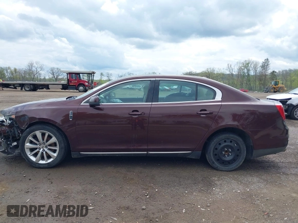 2009 Lincoln MKS z VIN 1LNHM93R09G612169, wystawiony jako IAAI lot #42126437 z przebiegiem 158 393 mil mil oraz . Historia ofert i sprzedaży dostępna na DreamBid. Obrazek 15.