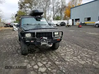 1996 Jeep Cherokee Sport with VIN 1J4FJ68S4TL240696, listed as a Copart auction lot 81193184 with 125,682 mi miles and Salvage Title. Bid and sale history available at carsss.com. Image 11.
