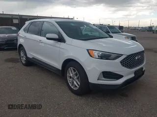 2024 Ford Edge SEL z VIN 2FMPK4J90RBA77889, wystawiony jako IAAI lot #42484303 z przebiegiem 51 211 mil mil oraz . Historia ofert i sprzedaży dostępna na DreamBid. Obrazek 1.