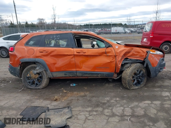 2015 Jeep Cherokee Trailhawk z VIN 1C4PJMBS9FW750858, wystawiony jako IAAI lot #41741305 z przebiegiem Nie podano mil oraz . Historia ofert i sprzedaży dostępna na DreamBid. Obrazek 13.