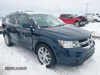 2014 Dodge Journey R/T z VIN 3C4PDDFG9ET106780, wystawiony jako IAAI lot #41166069 z przebiegiem 69 440 mil mil oraz . Historia ofert i sprzedaży dostępna na DreamBid. Obrazek 1.
