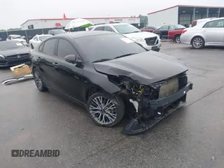 2023 Kia Forte GT-Line z VIN 3KPF54ADXPE641792, wystawiony jako IAAI lot #42048522 z przebiegiem 61 273 mil mil oraz . Historia ofert i sprzedaży dostępna na DreamBid. Obrazek 1.