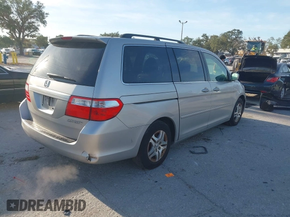 2005 Honda Odyssey EX-L with VIN 5FNRL38645B419566, listed as a IAAI auction lot 42104083 with 255,274 mi miles and . Bid and sale history available at carsss.com. Image 4.