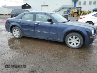 2005 Chrysler 300 Touring with VIN 2C3JA53G05H558414, listed as a Copart auction lot 54535455 with 157,828 mi miles and Salvage Title. Bid and sale history available at DreamBid. Image 4.