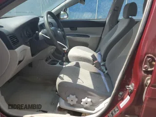 2006 Hyundai Accent GL z VIN KMHCN45C26U052459, wystawiony jako Copart lot #60089355 z przebiegiem 247 311 mil mil oraz Szkoda całkowita • Salvage title. Historia ofert i sprzedaży dostępna na DreamBid. Obrazek 7.