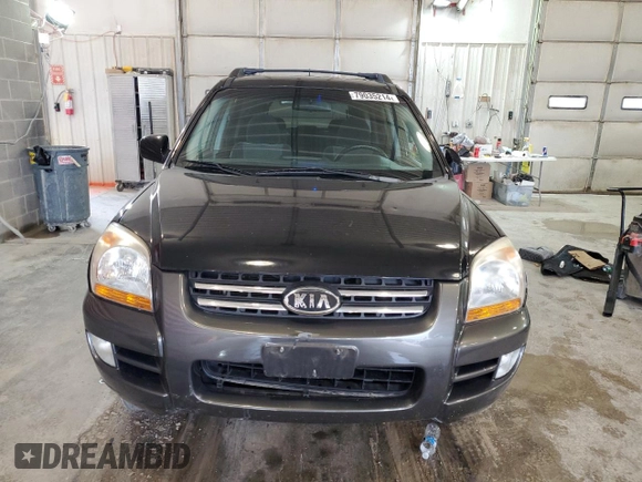 2005 Kia Sportage LX with VIN KNDJE723X57131795, listed as a Copart auction lot 79035214 with 146,746 mi miles and Salvage Title. Bid and sale history available at carsss.com. Image 5.