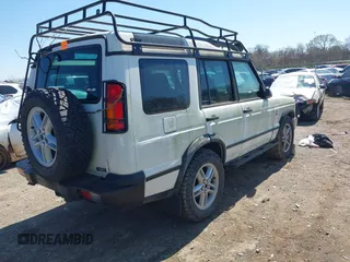 2004 Land Rover Discovery SE z VIN SALTY19484A841591, wystawiony jako IAAI lot #41846869 z przebiegiem 137 886 mil mil oraz . Historia ofert i sprzedaży dostępna na DreamBid. Obrazek 4.