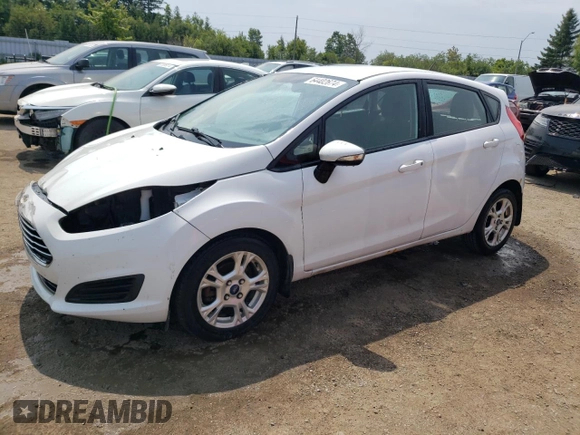 2015 Ford Fiesta SE z VIN 3FADP4EJ7FM169000, wystawiony jako Copart lot #64402674 z przebiegiem 191 221 mil mil oraz Szkoda całkowita • Salvage title. Historia ofert i sprzedaży dostępna na DreamBid. Obrazek 1.