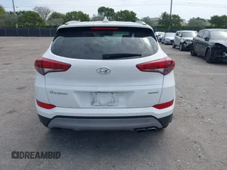 2018 Hyundai Tucson Sport with VIN KM8J33AL5JU691991, listed as a IAAI auction lot 41817480 with 89,129 mi miles. Bid and sale history available at carsss.com. Image 16.