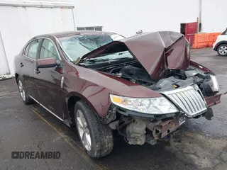 2009 Lincoln MKS with VIN 1LNHM94R59G624848, listed as a IAAI auction lot 38859698 with 129,520 mi miles. Bid and sale history available at carsss.com. Image 1.