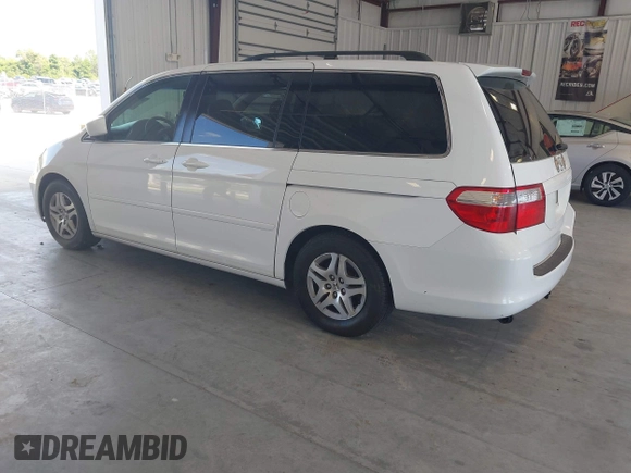 2005 Honda Odyssey EX with VIN 5FNRL38415B010150, listed as a IAAI auction lot 42844859 with 174,421 mi miles and . Bid and sale history available at DreamBid. Image 3.