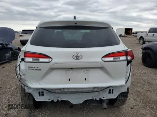 2024 Toyota Corolla Cross L with VIN 7MUAAAAG6RV086028, listed as a Copart auction lot 55079765 with 25,508 mi miles and Salvage title. Bid and sale history available at DreamBid. Image 6.