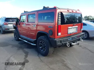2003 Hummer H2 with VIN 5GRGN23U23H104200, listed as a IAAI auction lot 41687769 with 1 mi miles. Bid and sale history available at carsss.com. Image 3.