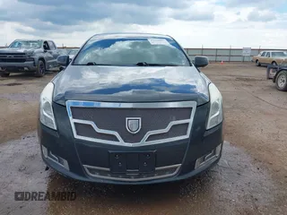 2013 Cadillac XTS Platinum z VIN 2G61V5S32D9102537, wystawiony jako IAAI lot #42230895 z przebiegiem 120 810 mil mil oraz . Historia ofert i sprzedaży dostępna na DreamBid. Obrazek 12.
