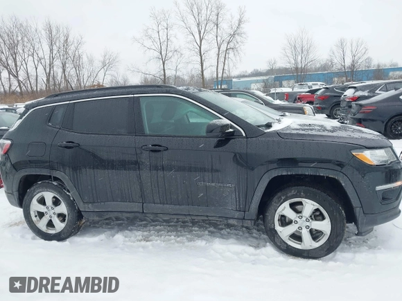 2018 Jeep Compass Altitude with VIN 3C4NJDBB6JT307069, listed as a IAAI auction lot 41351646 with 50,387 mi miles and . Bid and sale history available at carsss.com. Image 13.