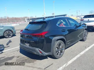 2021 Lexus UX with VIN JTHR9JBH7M2052899, listed as a IAAI auction lot 41878321 with 48,837 mi miles. Bid and sale history available at carsss.com. Image 4.