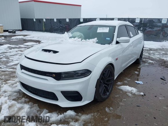 2022 Dodge Charger Scat Pack Widebody with VIN 2C3CDXGJ4NH183094, listed as a IAAI auction lot 41300119 with 31,800 mi miles and . Bid and sale history available at carsss.com. Image 2.