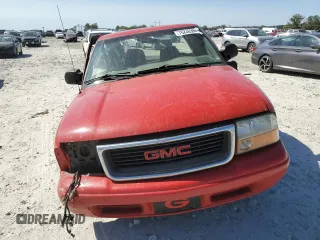 2003 GMC Sonoma SLS z VIN 1GTCS19X138192032, wystawiony jako Copart lot #76230394 z przebiegiem 116 046 mil mil oraz Szkoda całkowita • Salvage title. Historia ofert i sprzedaży dostępna na DreamBid. Obrazek 5.