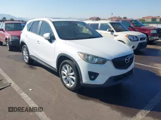 2014 Mazda CX-5 Grand Touring with VIN JM3KE4DY4E0375809, listed as a IAAI auction lot 41468078 with 151,226 mi miles. Bid and sale history available at carsss.com. Image 1.